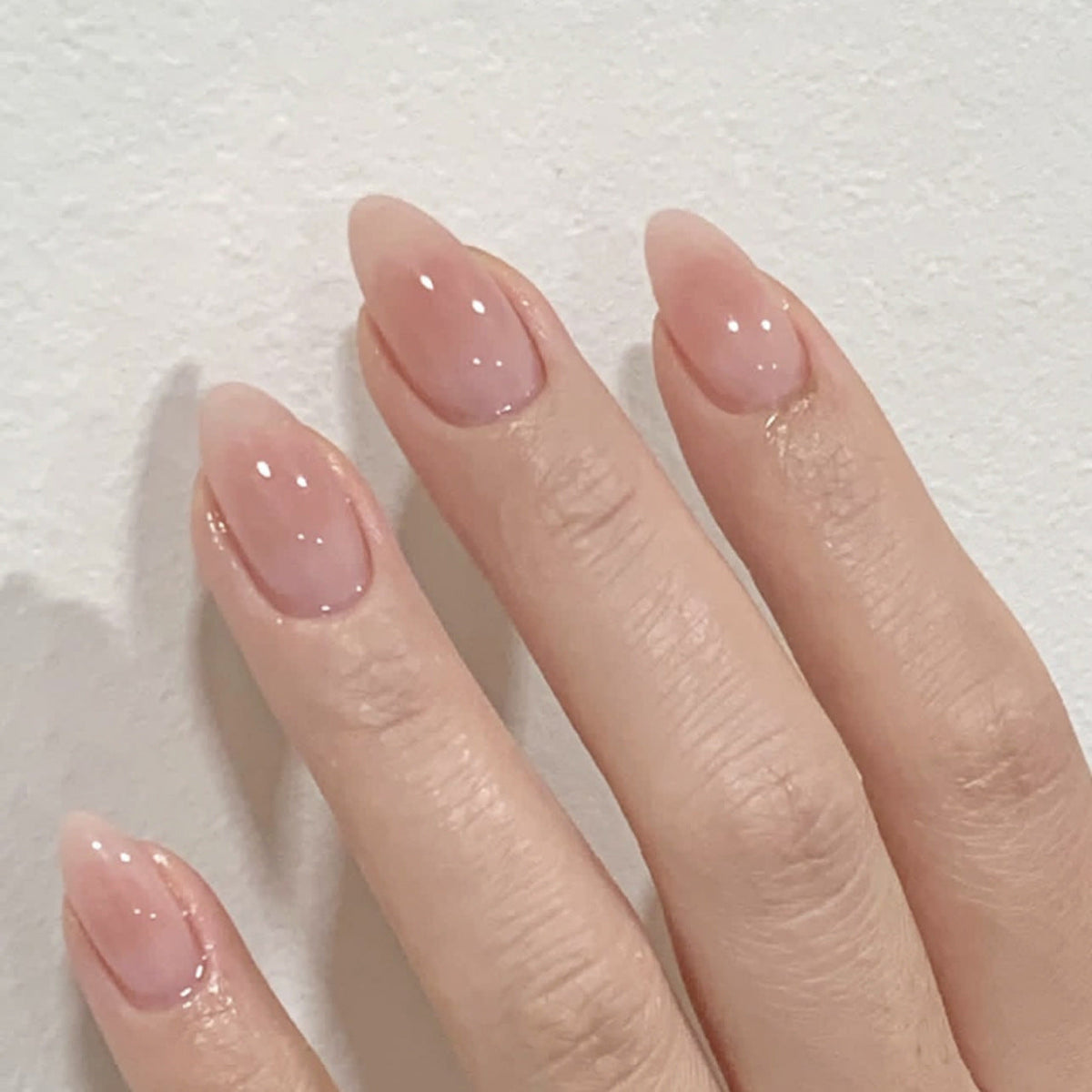 Simple nude blush smudge white almonds press-on nails